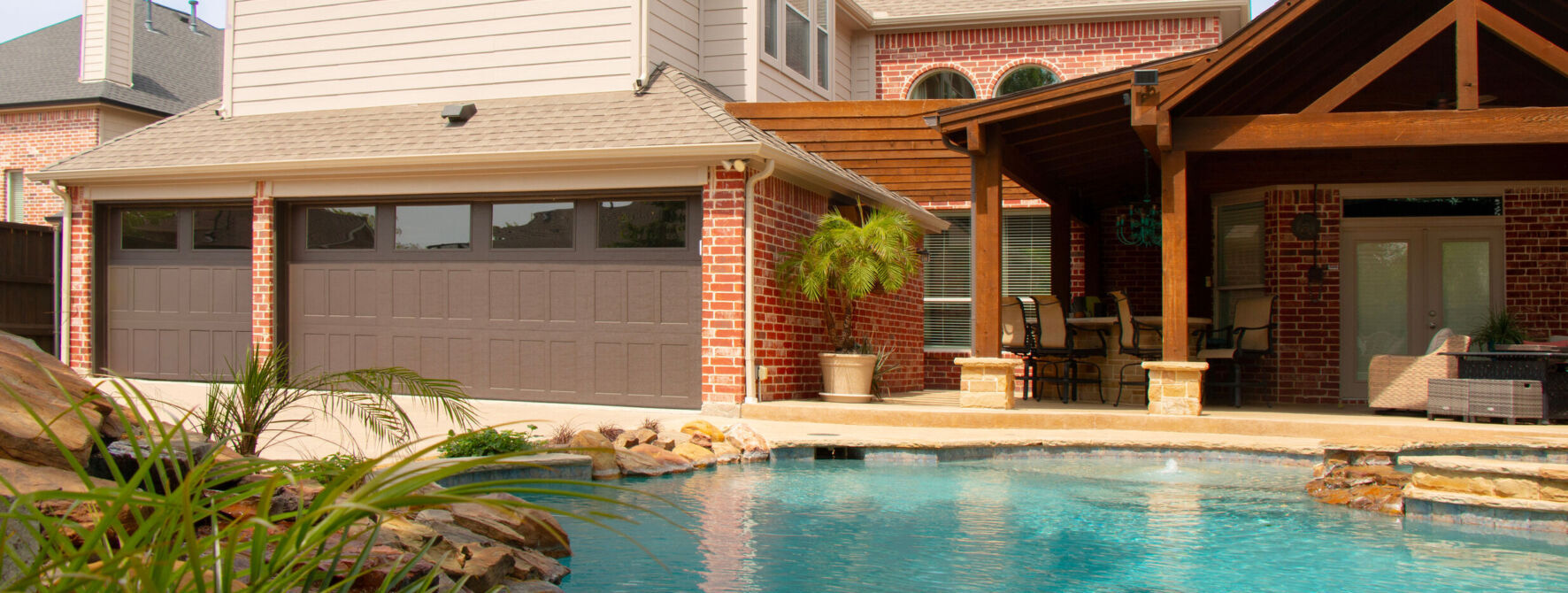 W-RD-Model-8310-Riverton, Brown Finish, Clear Windows- Designer Steel Garage Doors - Over the Top Garage Doors Albuquerque